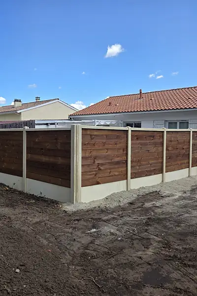 Après : Clôture béton & lames bois, Arès (Gironde)